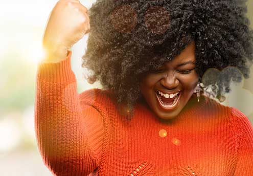 excited woman pumping fist