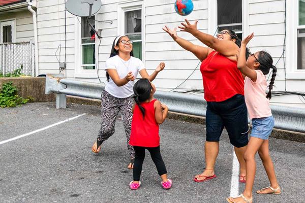 kids playing ball outdoors