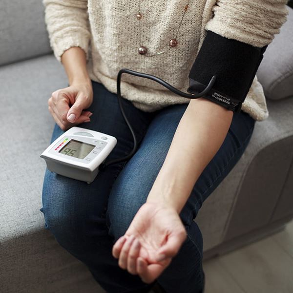 Woman Taking blood pressure