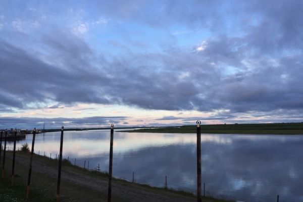 A beautiful sky over the river in Bethel, Alaska