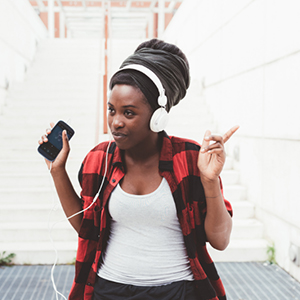 woman walking listening to music