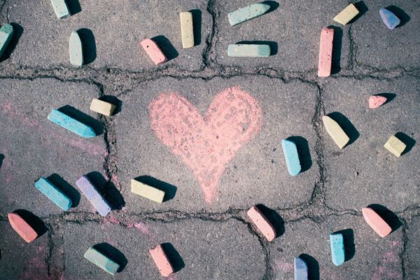 Heart drawn on sidewalk with chalk