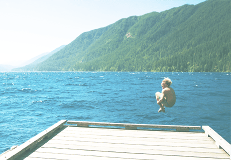 South Sound contact 2 Man jumping off a dock into a lake