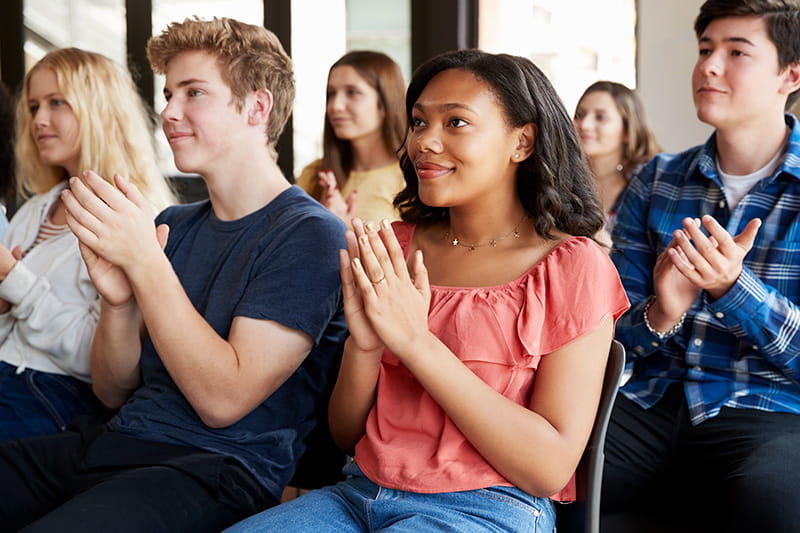 high school kids clapping
