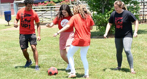 high school kids playing soccer high school kids playing soccer