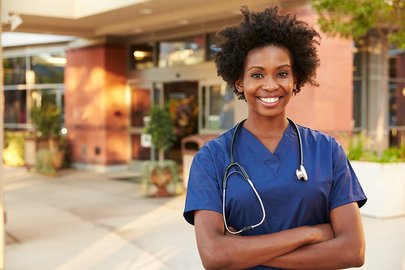 doctor smiling outdoors doctor smiling outdoors