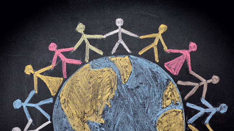 chalk stick figures surround the earth holding hands