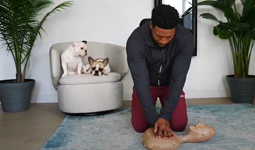 Jocko Sims performs hands only cpr