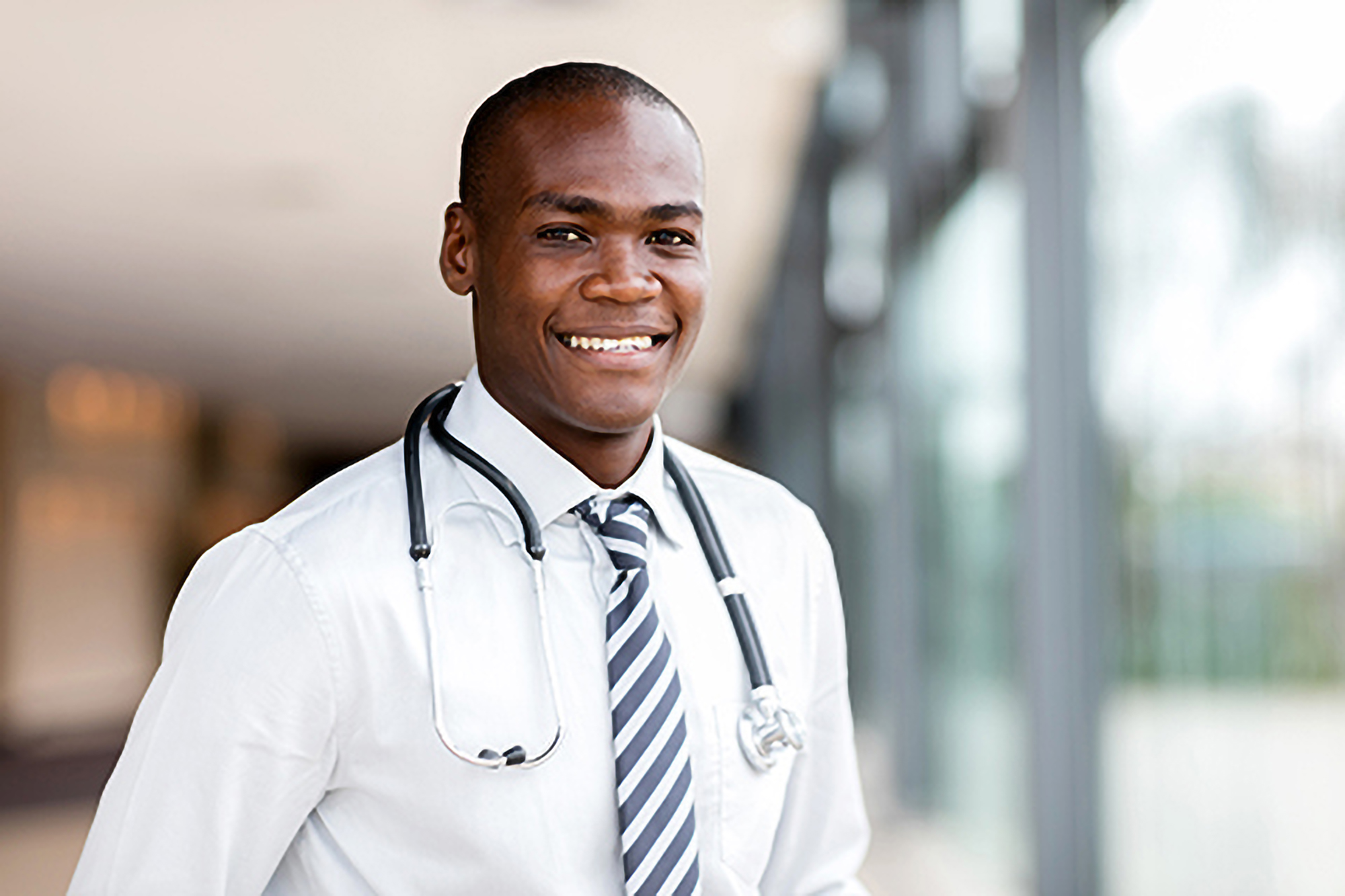 doctor smiling in hallway