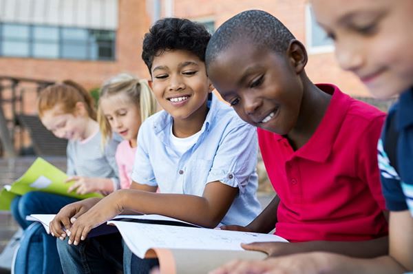 kids reading schoolwork