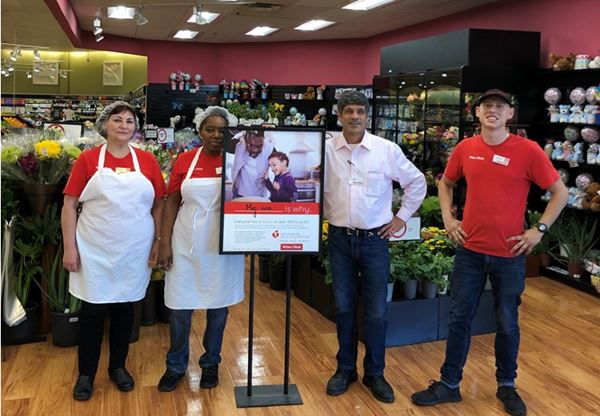 Southeastern Grocers team members standing in floral department