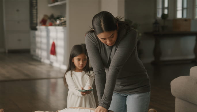 Mother performing CPR