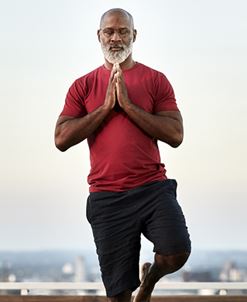 balancing man does yoga balancing man does yoga