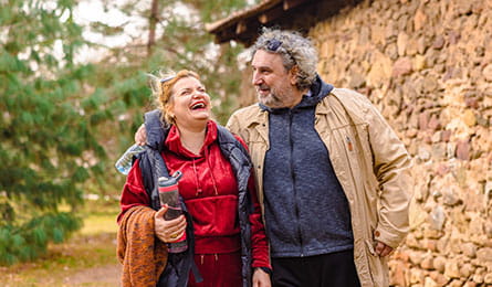 stock photo of smiling happy couple in the outdoors