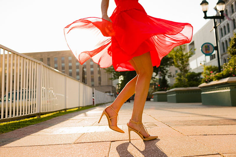 close up of woman's legs dancing in street close up of woman's legs dancing in street