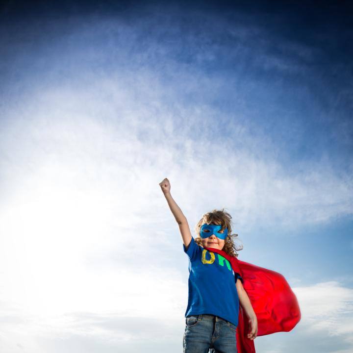 Superhero young boy