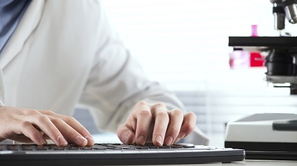 Researcher at desk