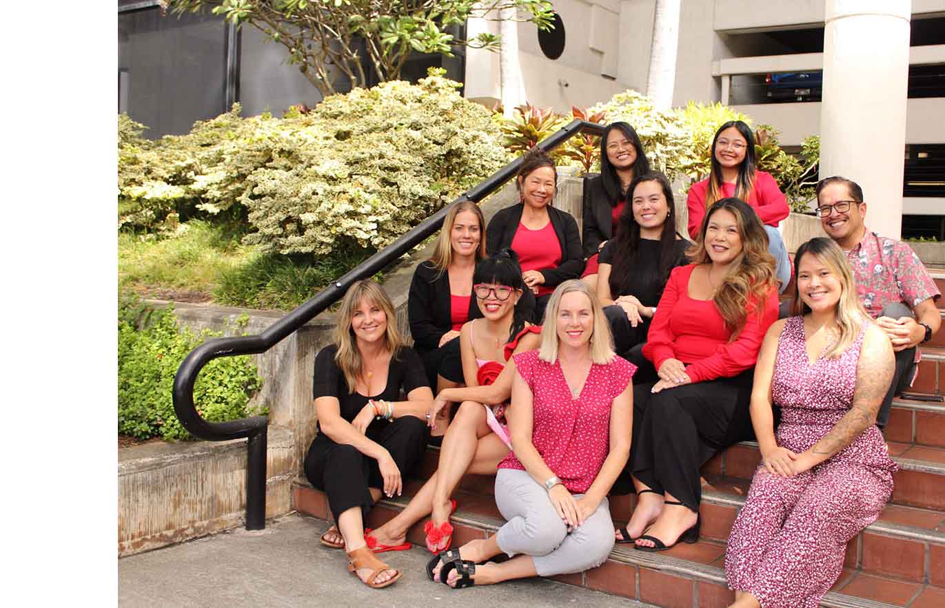 AHA staff sitting at stairs