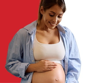 LE8 woman looking at pregnant belly