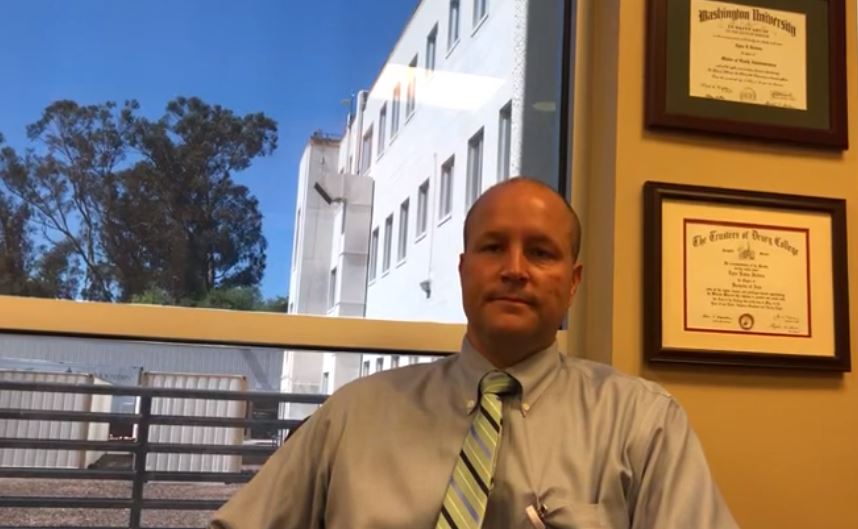 Tyler Hedden, Chief Executive of Providence, sitting at his desk