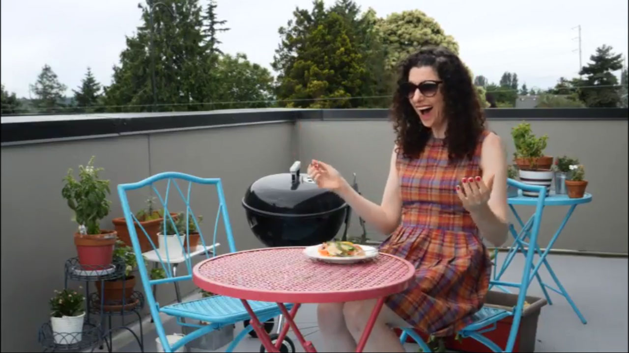 woman looking excited at a salad