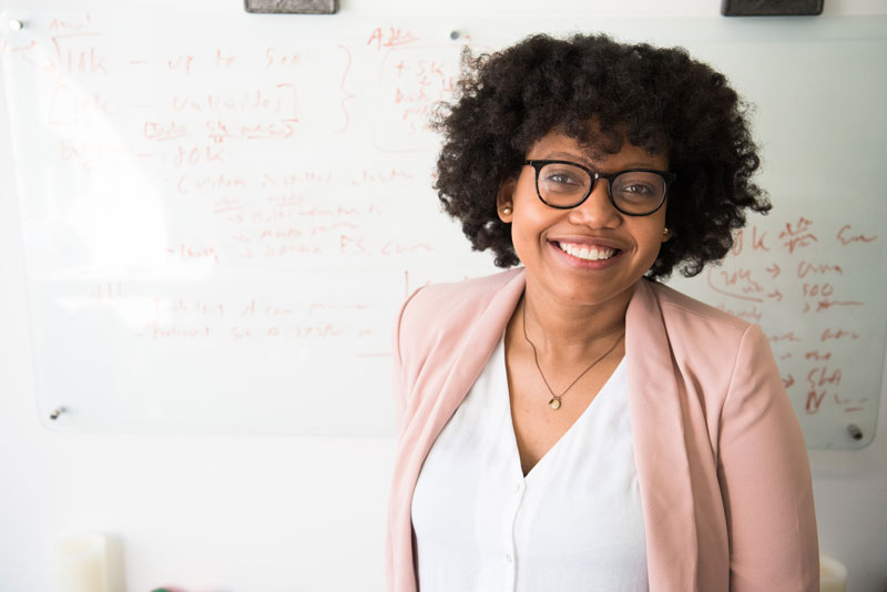 teacher in front of board