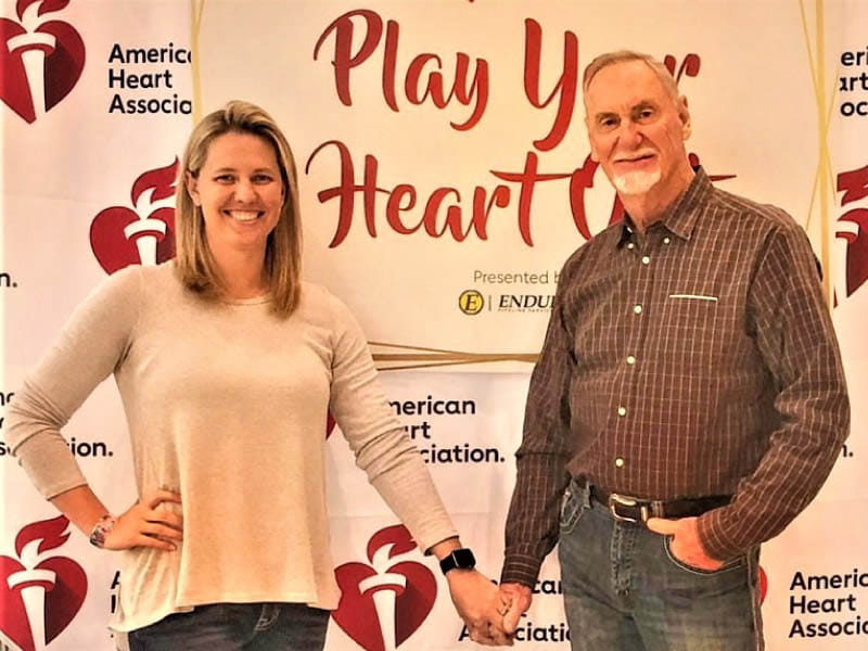 Robin Riley and Dwayne Laymon's efforts to improve heart health include the Play Your Heart Out initiative, which Laymon's company sponsored in 2019 to help Tulsa-area kids get more active and to collect donations of sports and recess equipment. (Photo courtesy of Anna Riley)