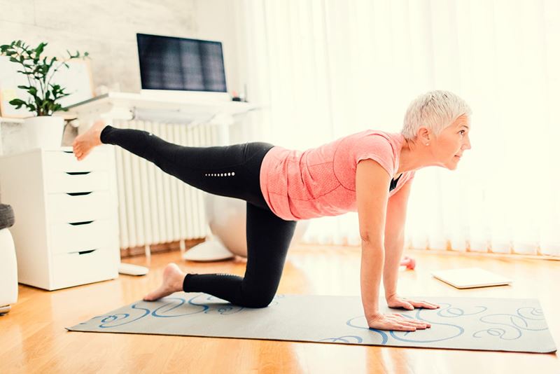 Older woman doing yoga