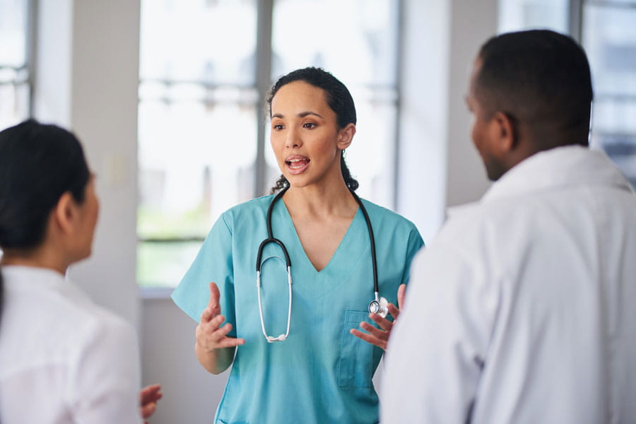 Group of medical professionals having a discussion