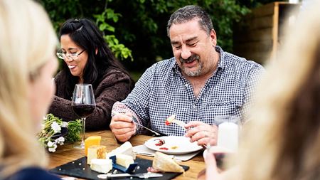 adults dining outdoors adults dining outdoors