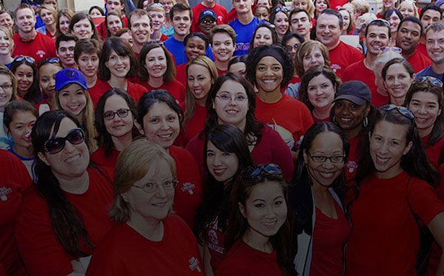 group of people posing for photo at a heart walk