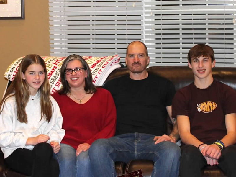 Sara Adair (in red sweater), with husband Brett and children April and Aaron