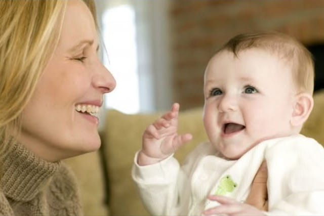 Amy Mazur-Hession holding 4-month-old Ella
