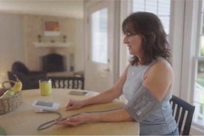 woman taking blood pressure