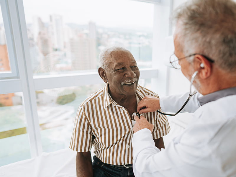 African American Male with Doctor