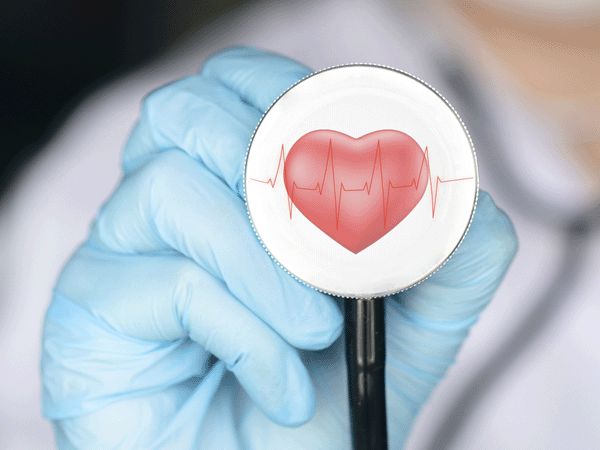 Heart on stethoscope and ekg