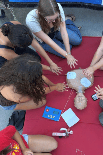 Students practicing Hands Only CPR