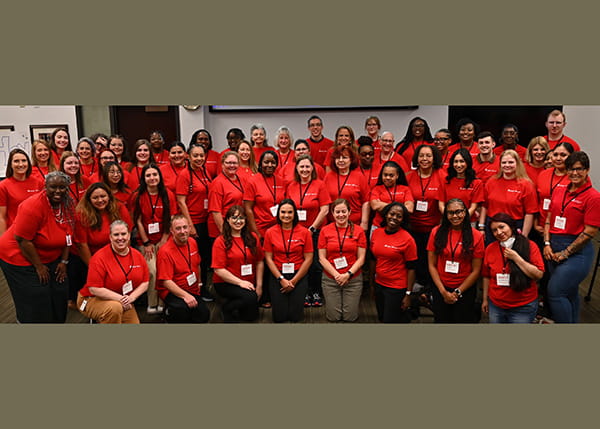 A large group of Rural at Heart team members posing for a team photo