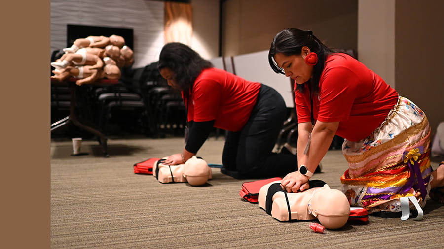 two Rural at Heart volunteers during CPR training