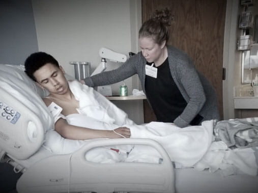 Dra laying in hospital bed after having a stroke Dra laying in hospital bed after having a stroke