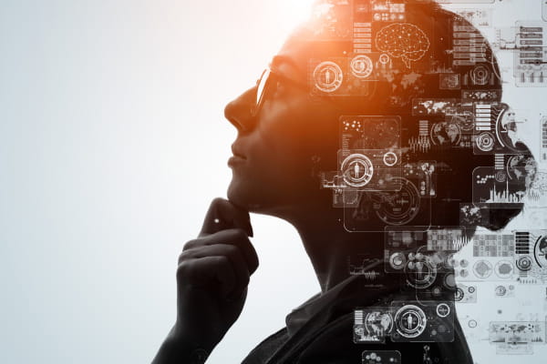 photo of a woman looking up and holding her hand to her chin in a thinking position, overlaid with illustrative designs of charts and graphs